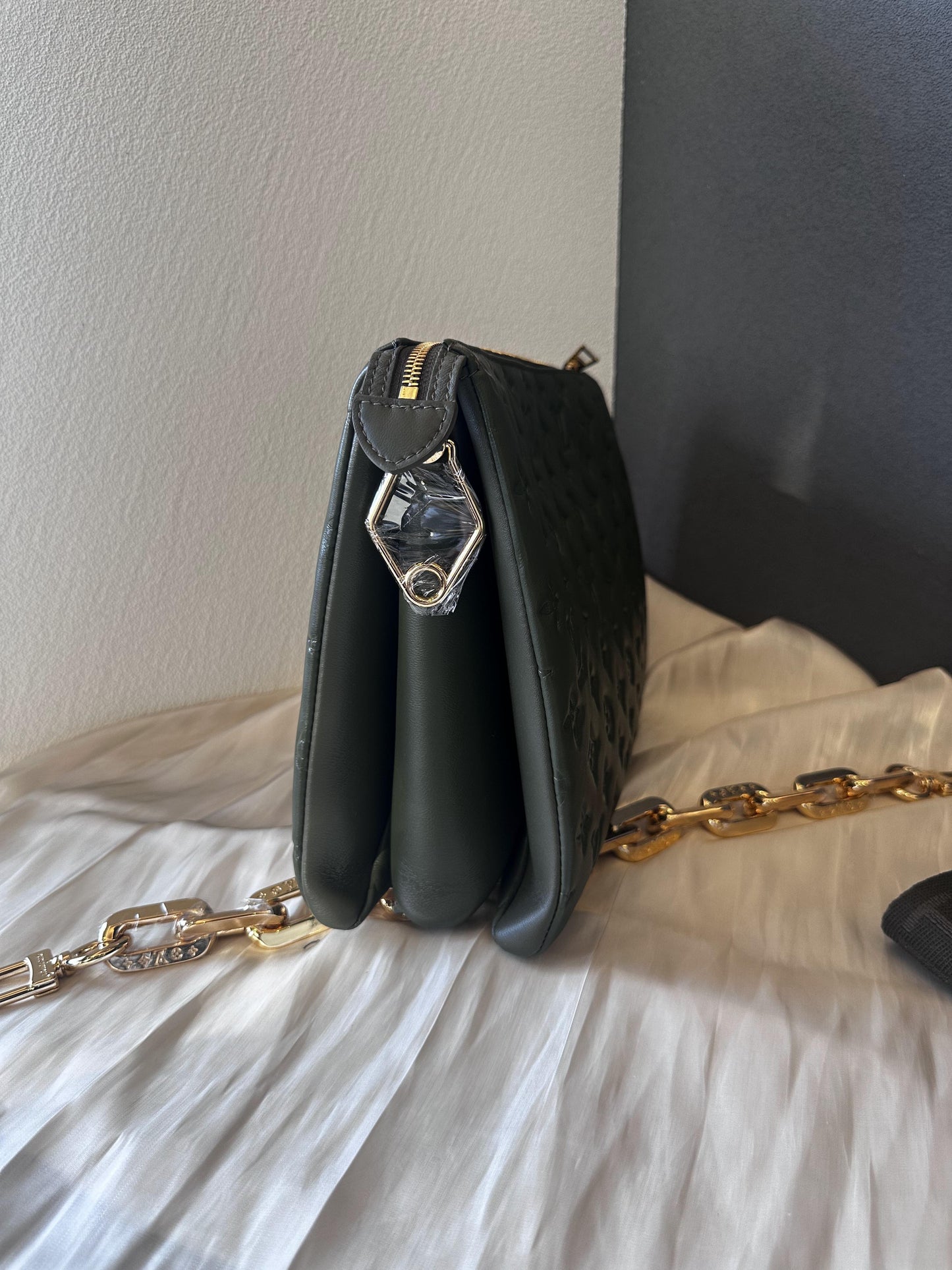 Louis Vuitton olive 'coussin' lambskin embossed accordion bag