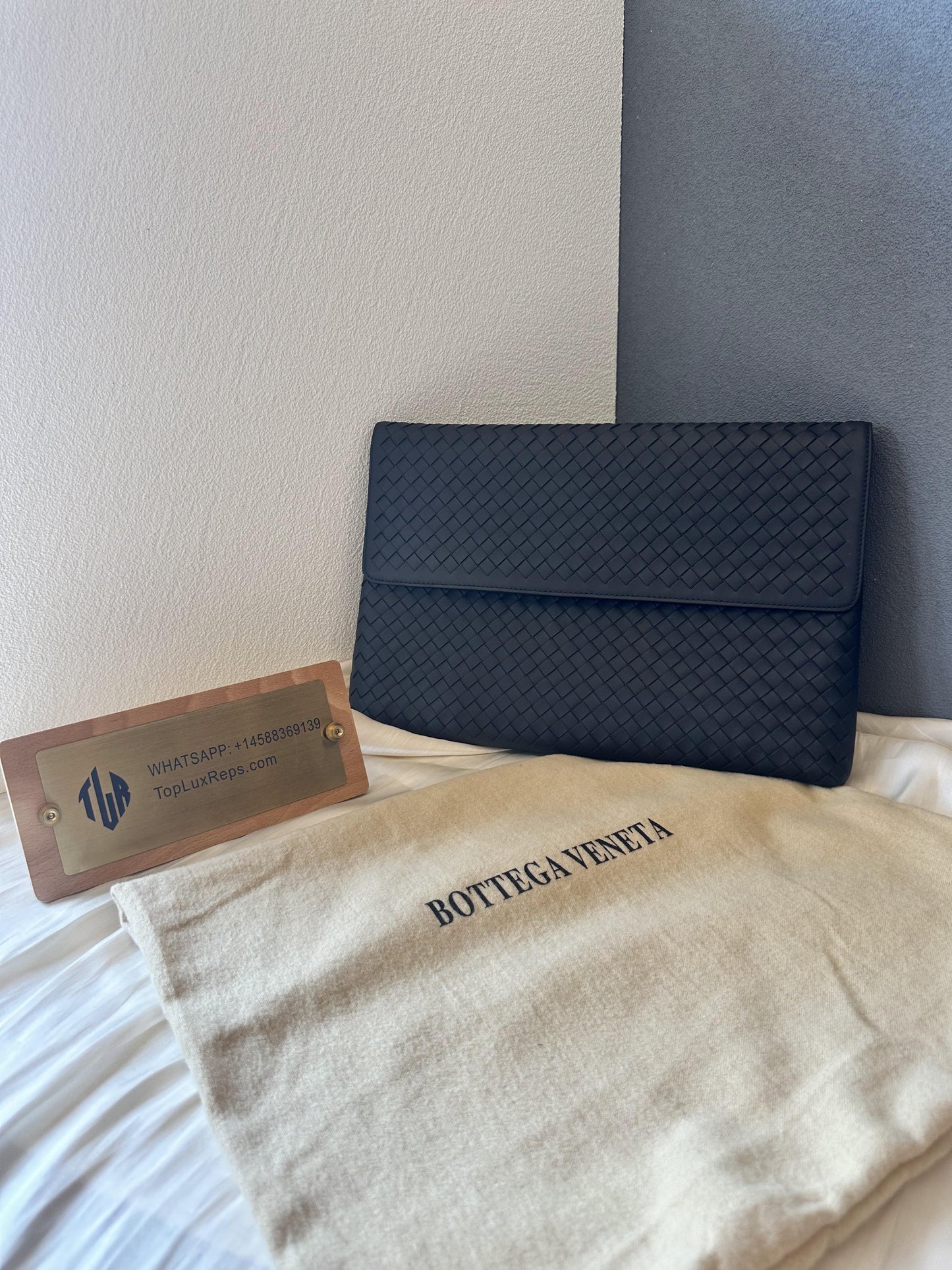 Bottega Veneta black leather mesh clutch bag