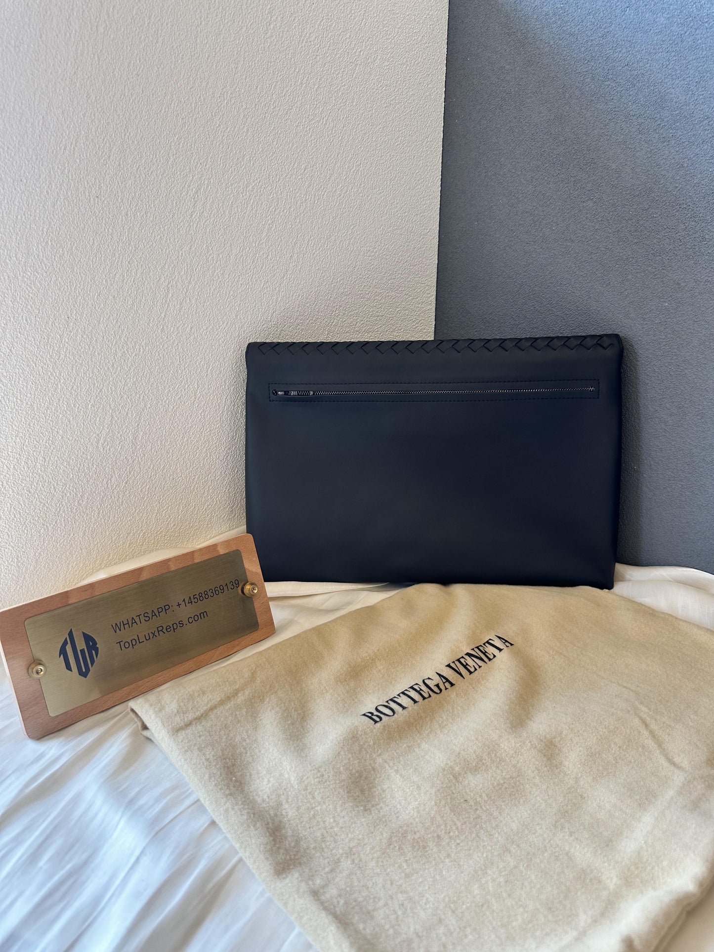 Bottega Veneta black leather mesh clutch bag