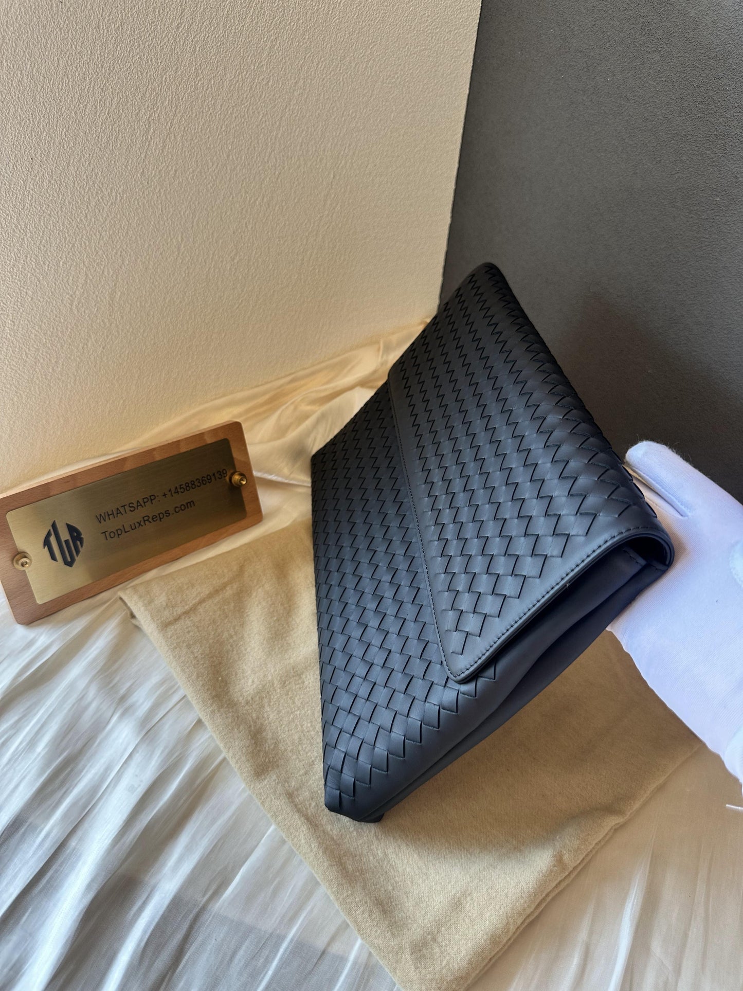 Bottega Veneta black leather mesh clutch bag