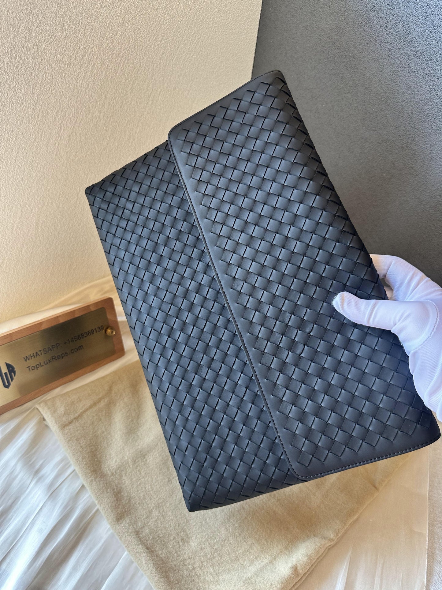 Bottega Veneta black leather mesh clutch bag