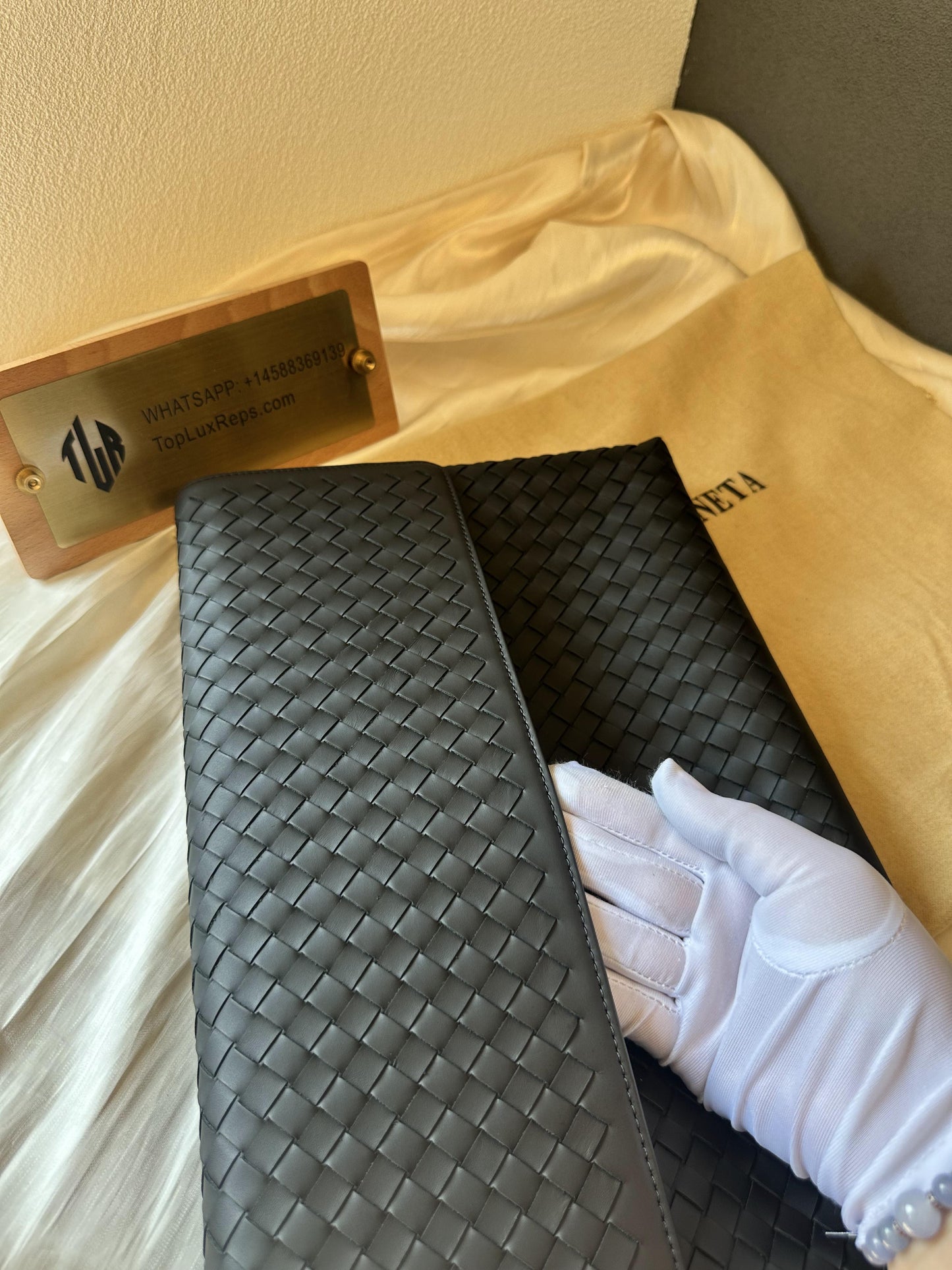 Bottega Veneta black leather mesh clutch bag