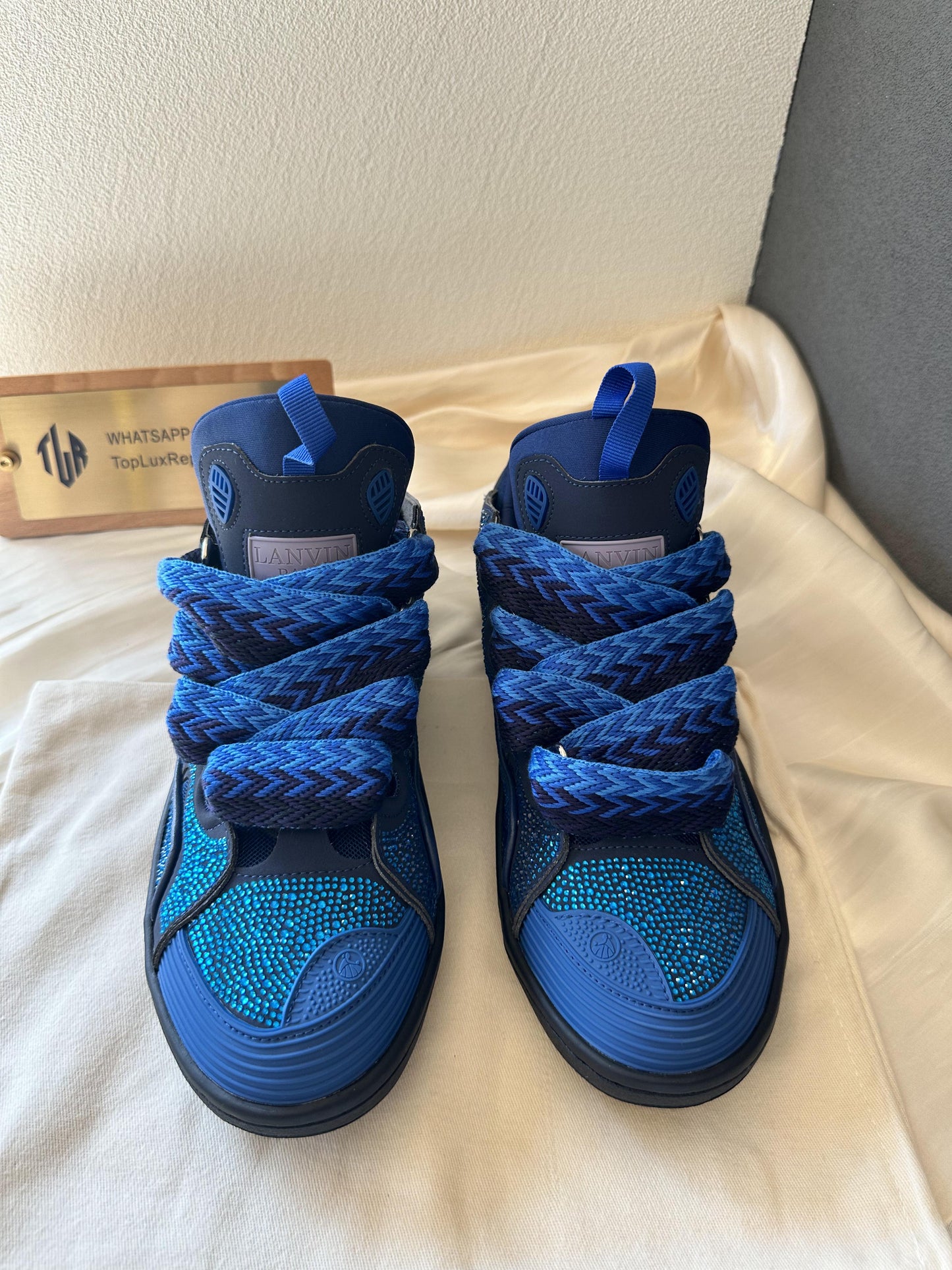 Lanvin curb sneakers in blue with rhinestone detailing