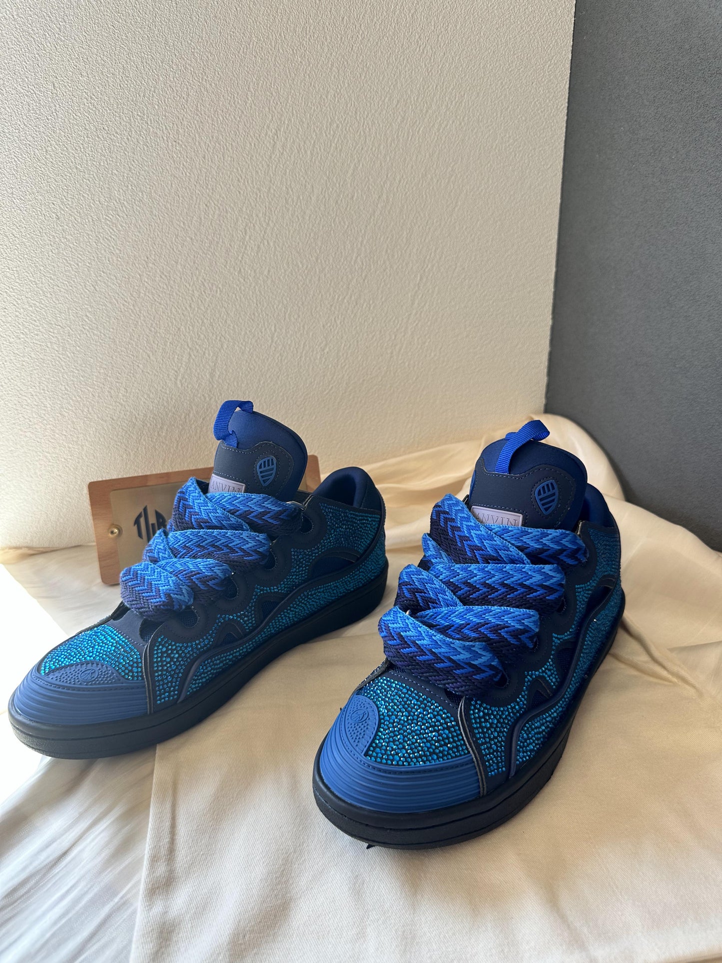 Lanvin curb sneakers in blue with rhinestone detailing