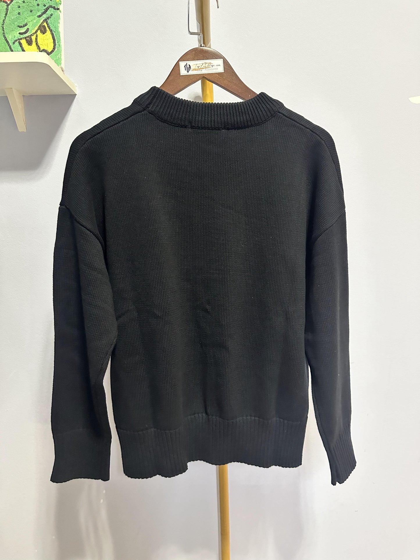 Ami heart embroidered black knit sweater - cozy pullover with signature red "A" logo