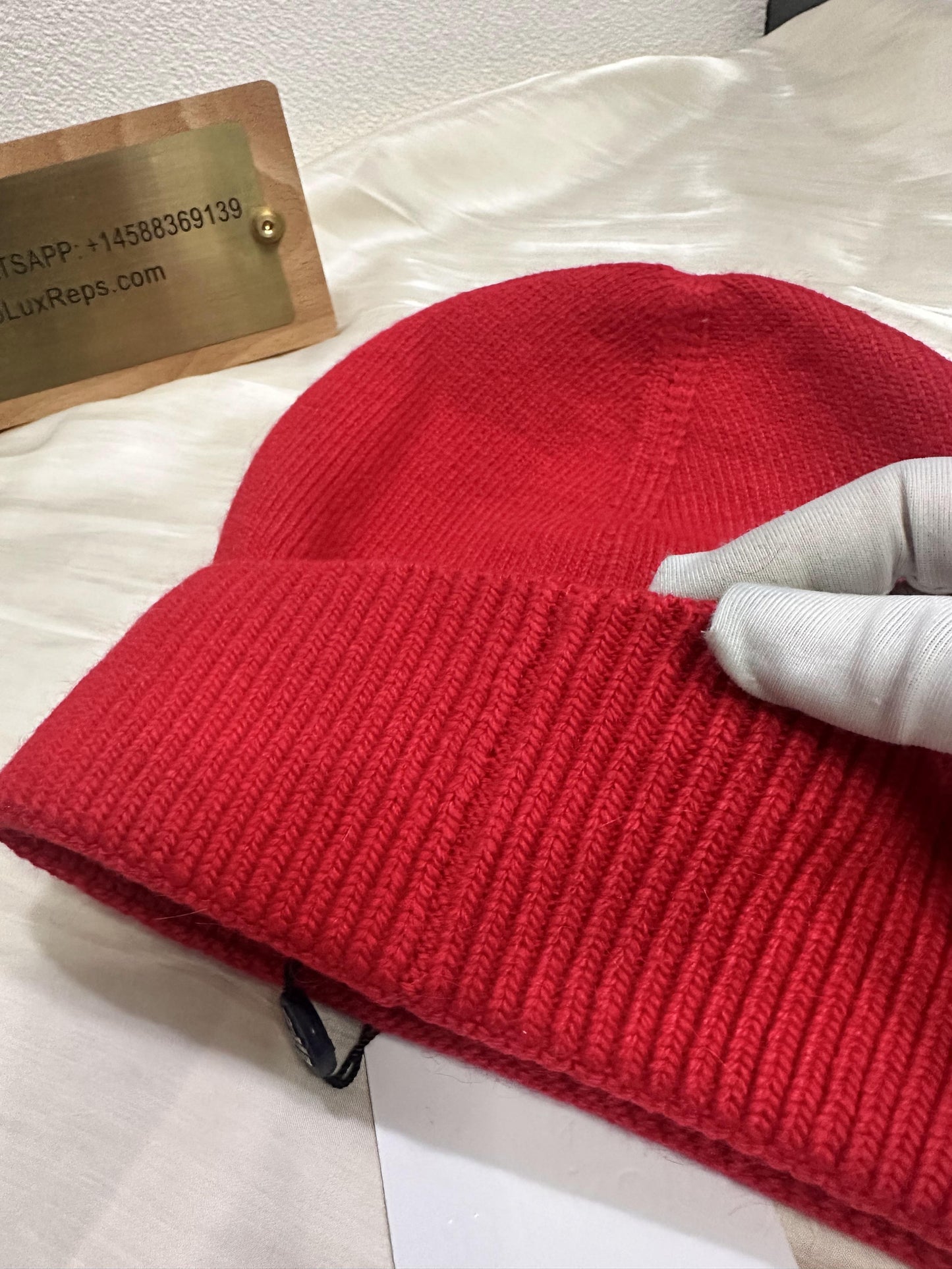 Moncler red wool beanie with iconic logo patch