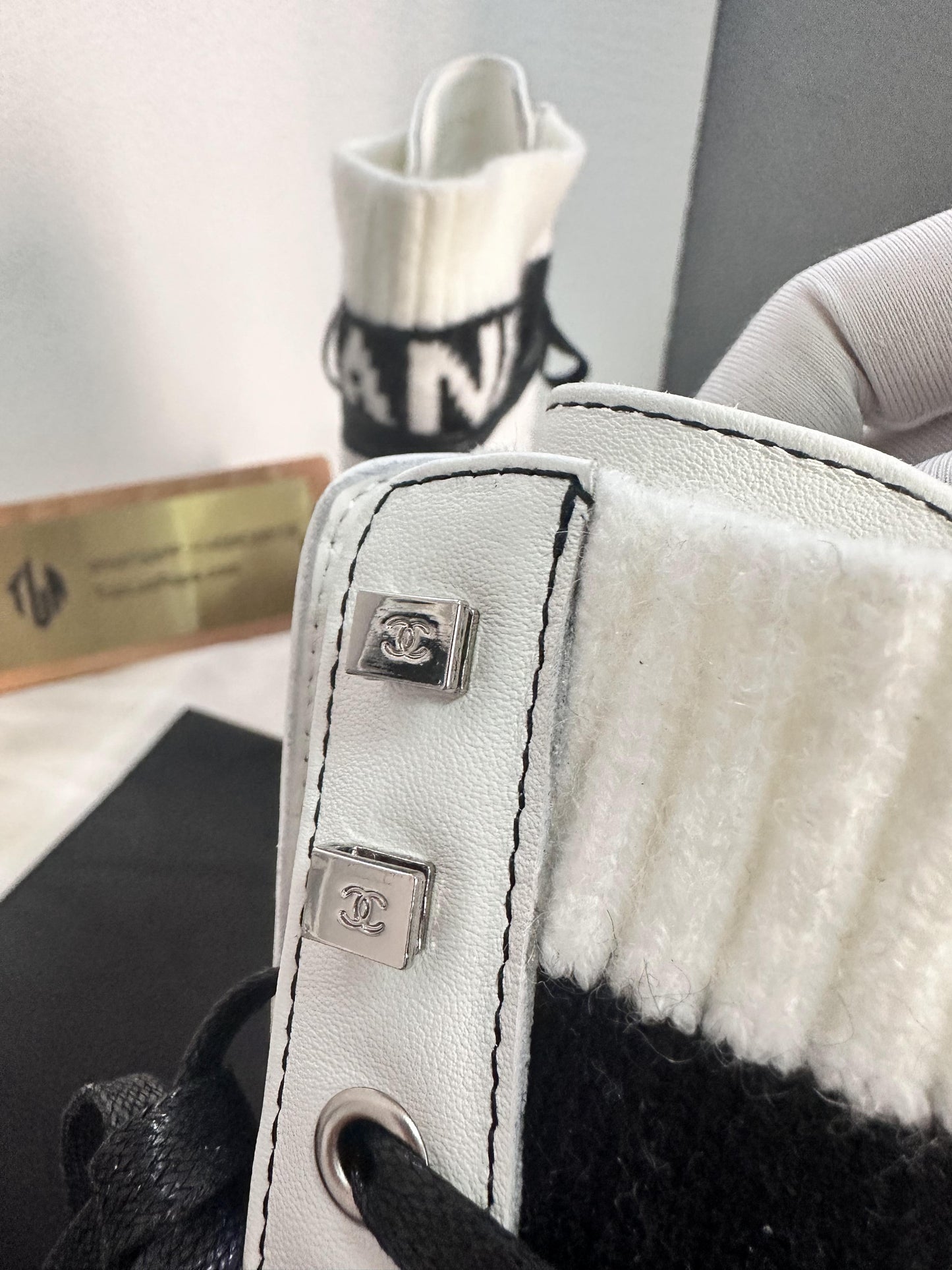 Chanel white combat boots with ribbed knit logo socks