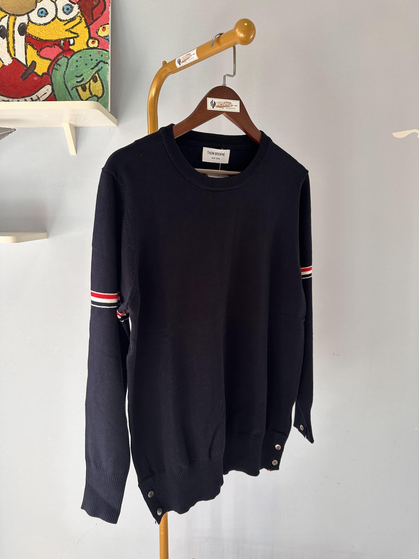 Thom Browne classic navy sweater with signature stripe detail