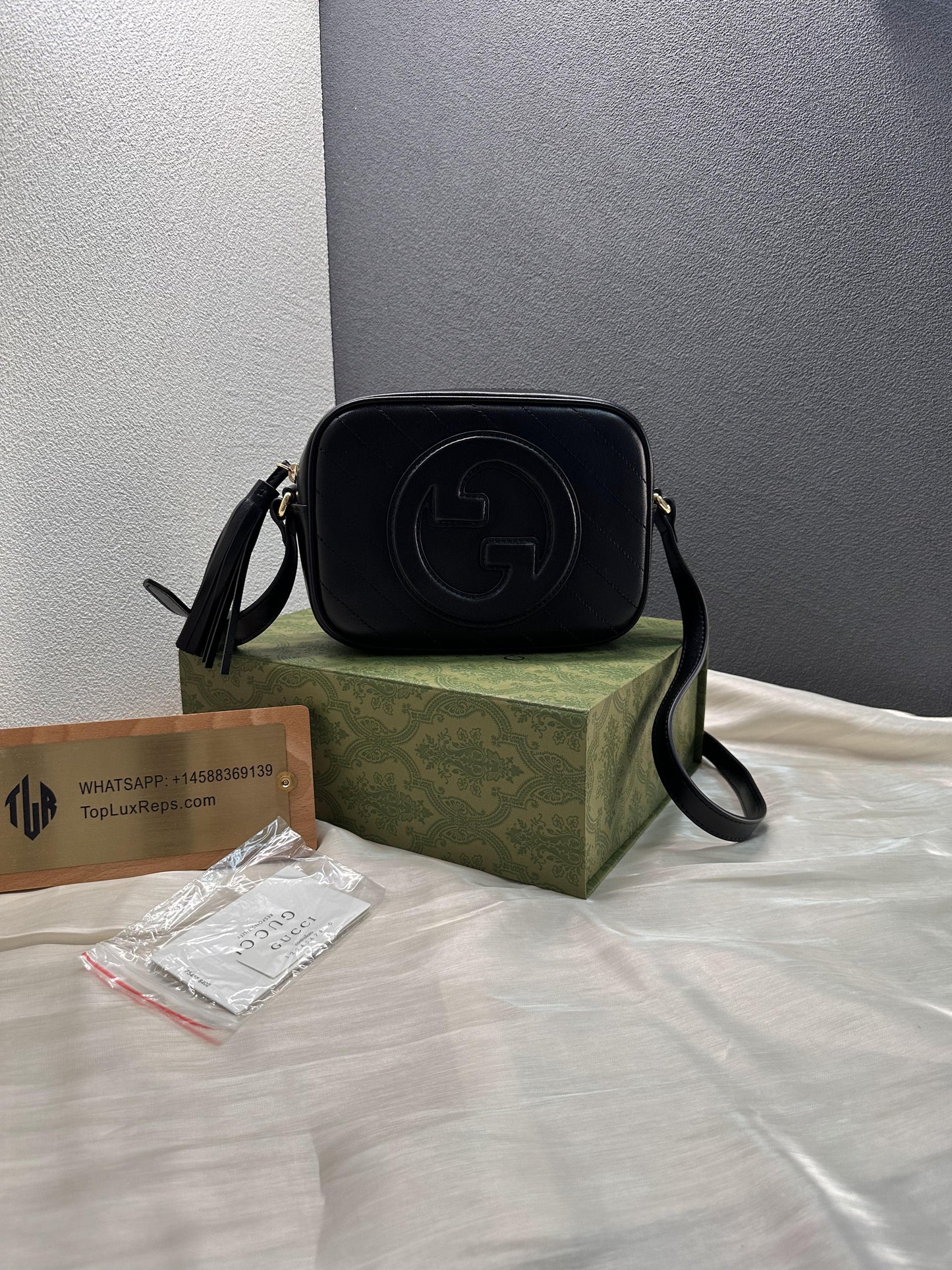 Gucci Black Leather GG Marmont Camera Bag with Quilted Design