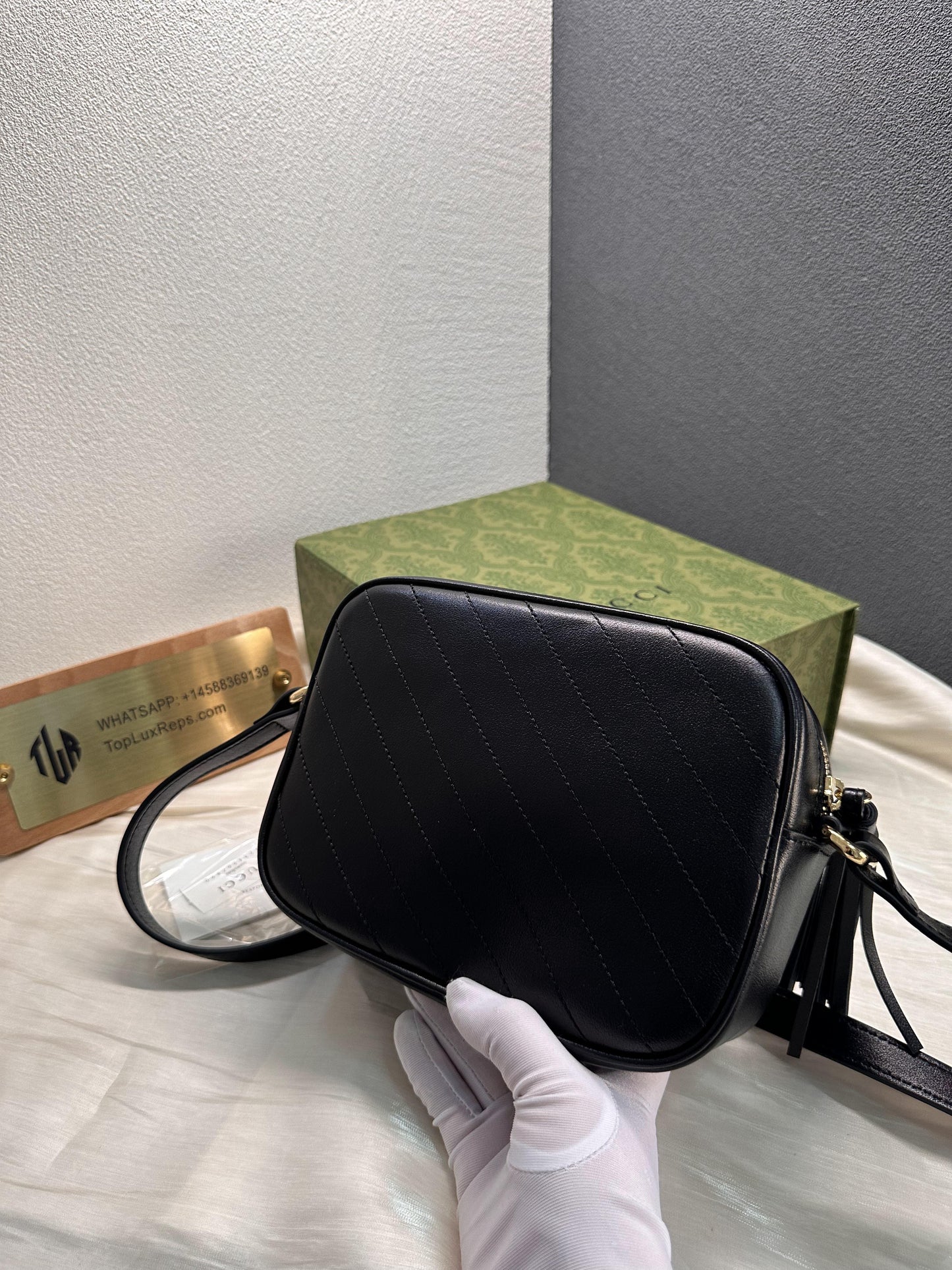 Gucci Black Leather GG Marmont Camera Bag with Quilted Design
