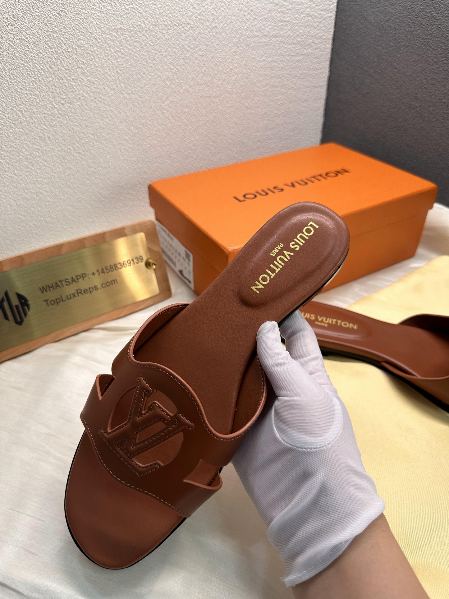 Louis Vuitton Isola slide slippers brown