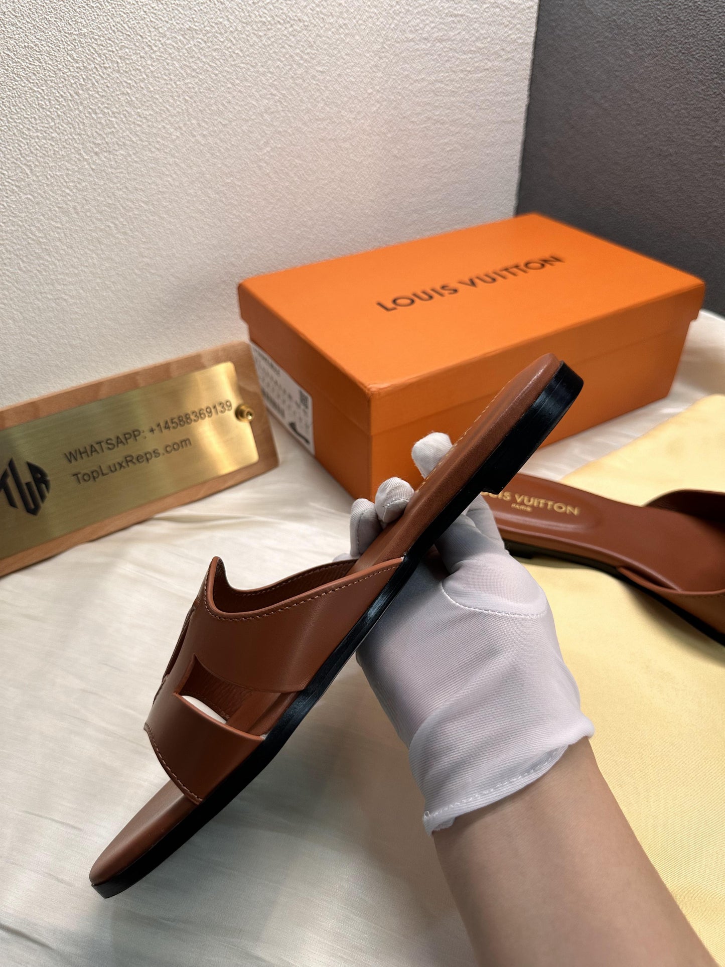 Louis Vuitton Isola slide slippers brown