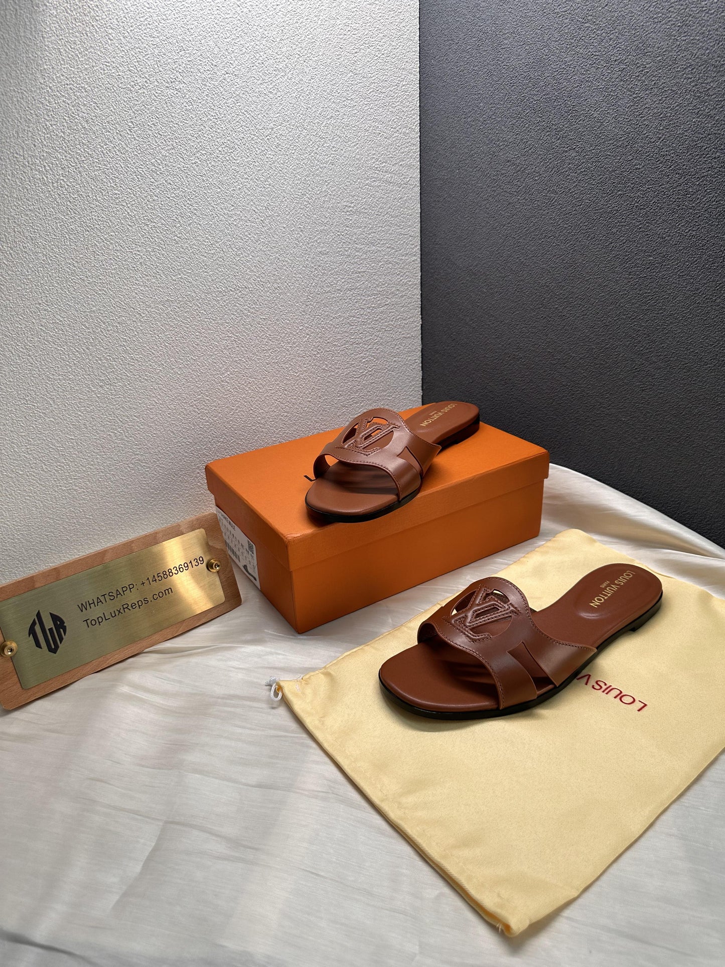 Louis Vuitton Isola slide slippers brown