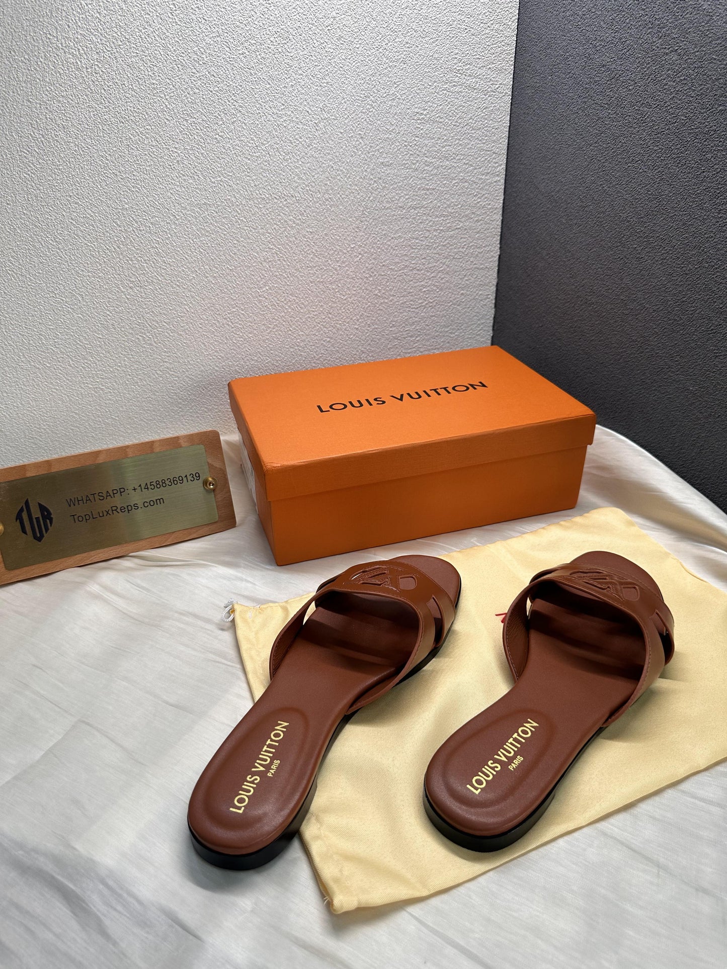 Louis Vuitton Isola slide slippers brown