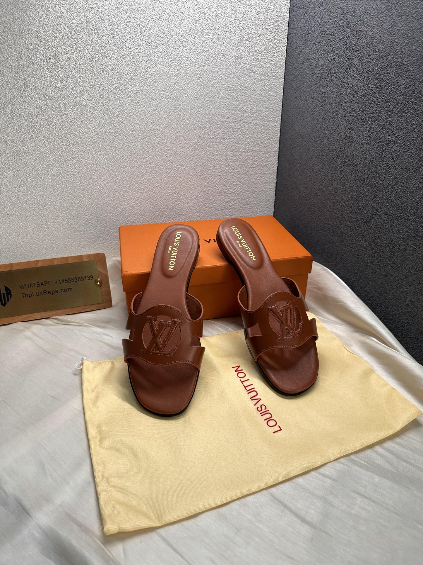 Louis Vuitton Isola slide slippers brown