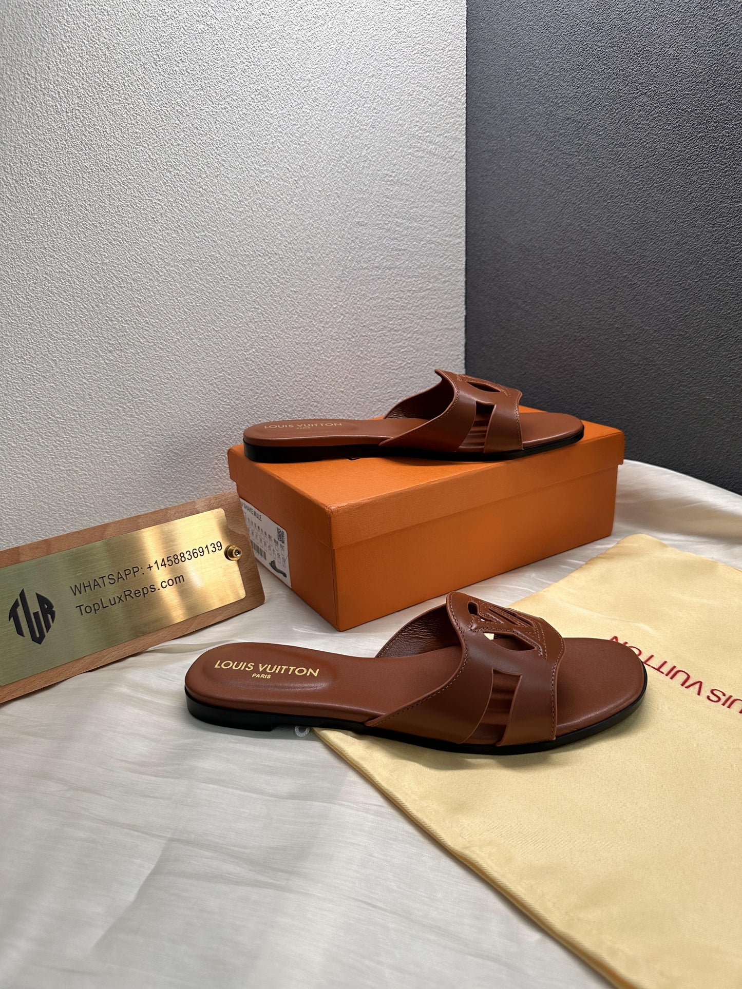 Louis Vuitton Isola slide slippers brown