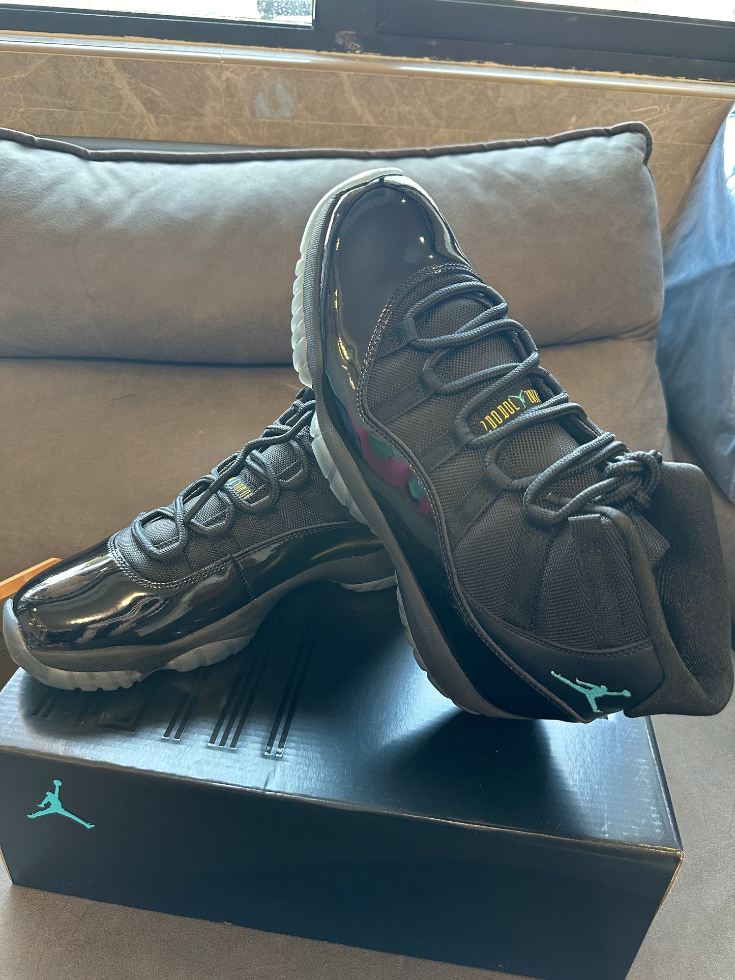 Air Jordan 11 Retro "Cap and Gown" Black Patent Leather Basketball Sneakers
