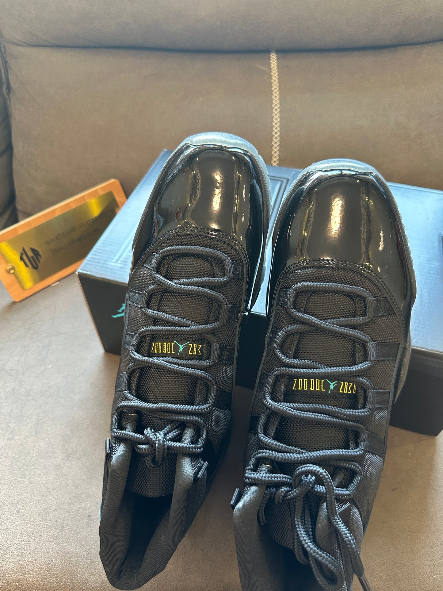 Air Jordan 11 Retro "Cap and Gown" Black Patent Leather Basketball Sneakers