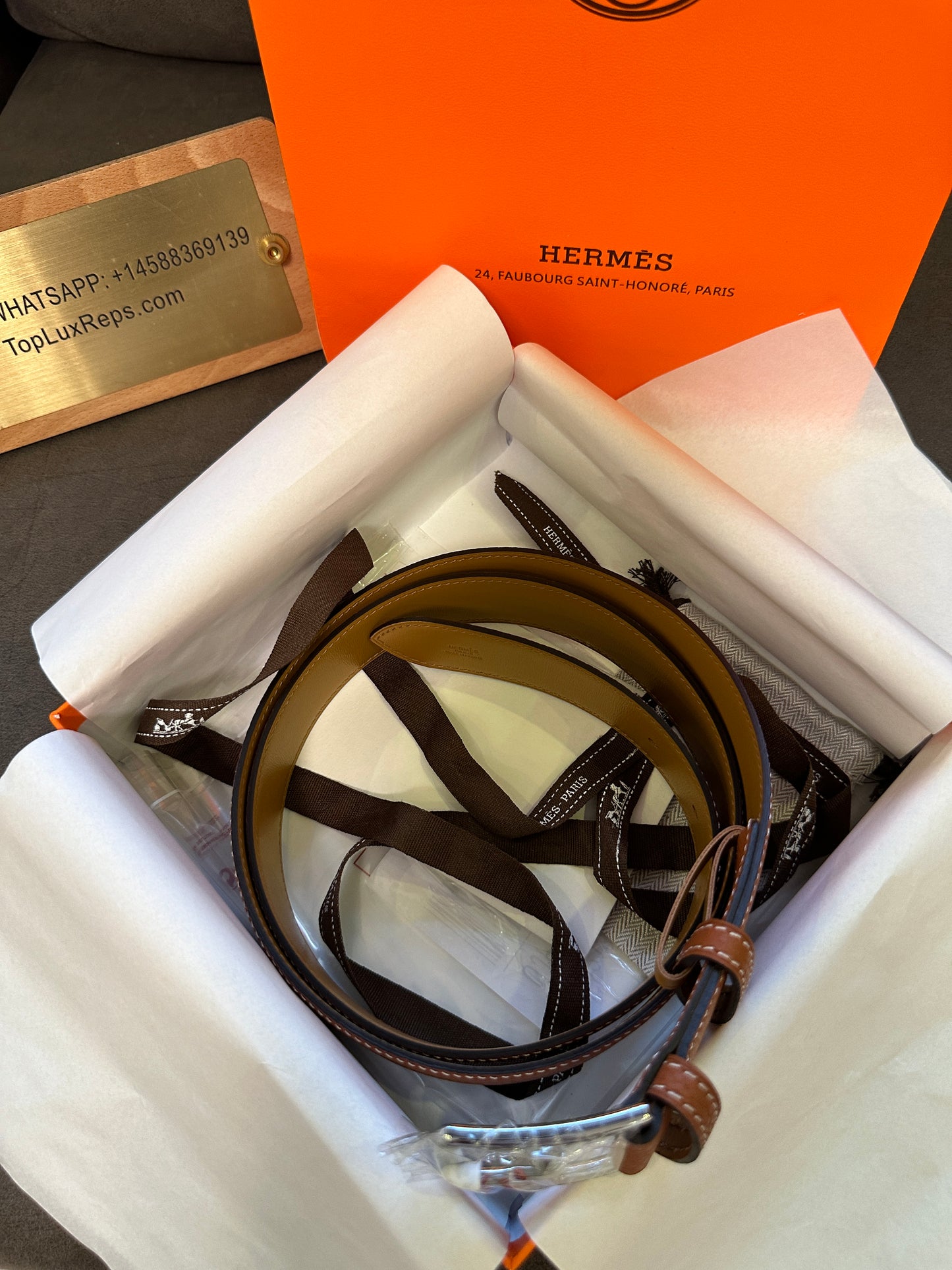 Hermès Leather Belt with Silver Buckle – Classic Reversible Design