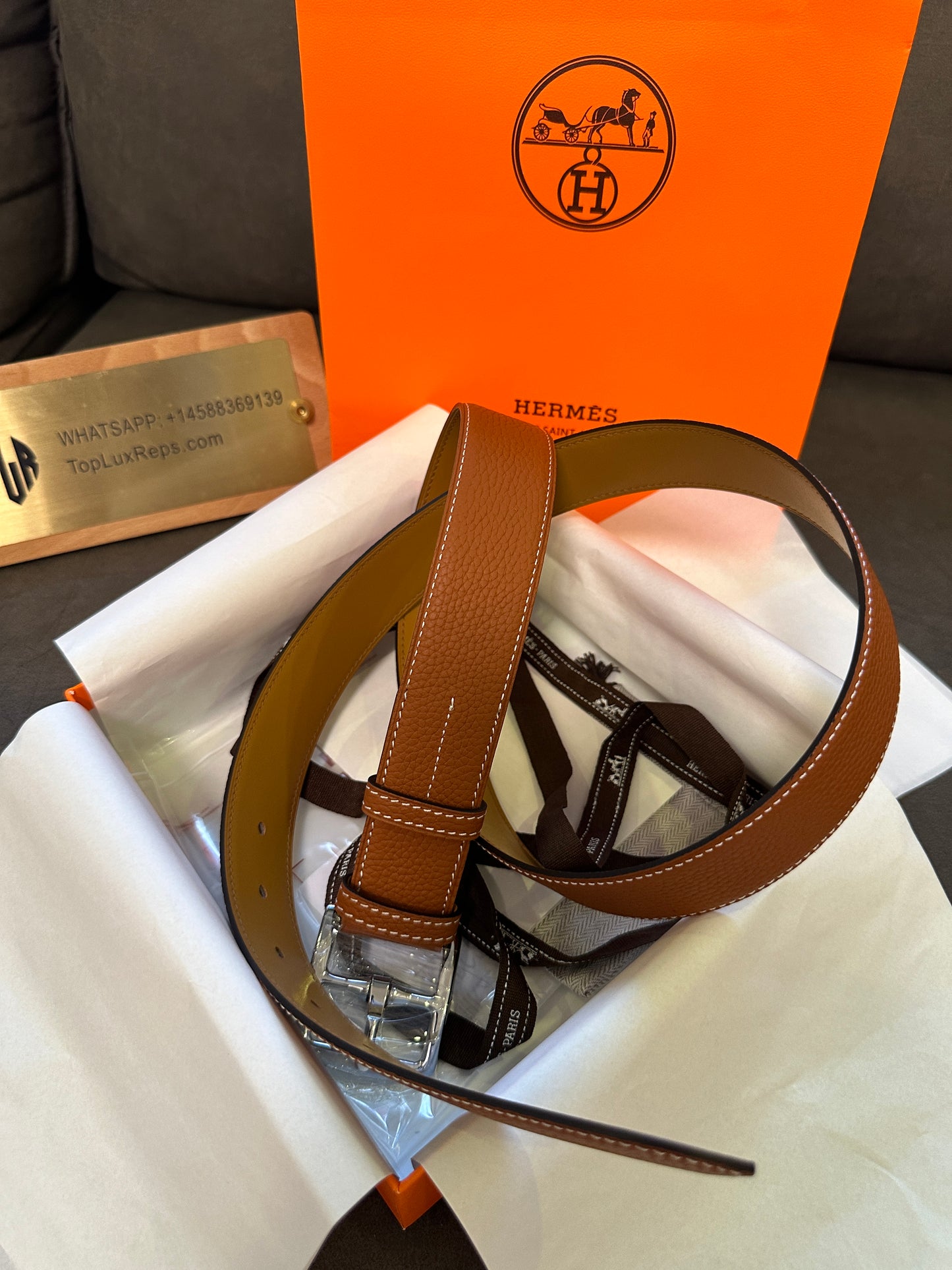 Hermès Leather Belt with Silver Buckle – Classic Reversible Design