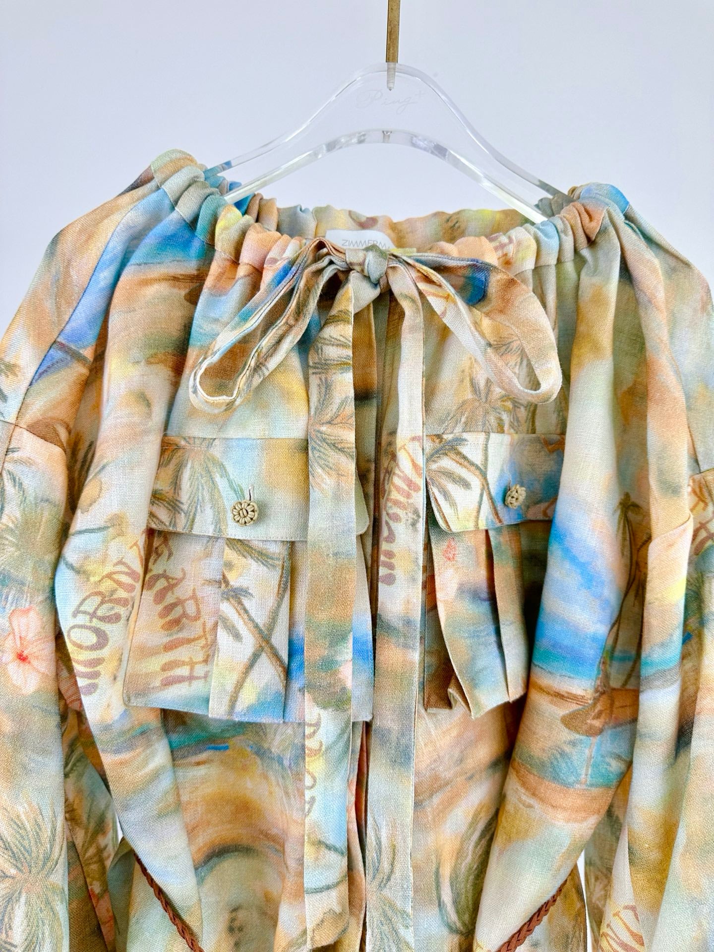 Robe courte en lin Zimmermann « ILLUMINATE » avec col à cordon et manches ballon – SS 2025