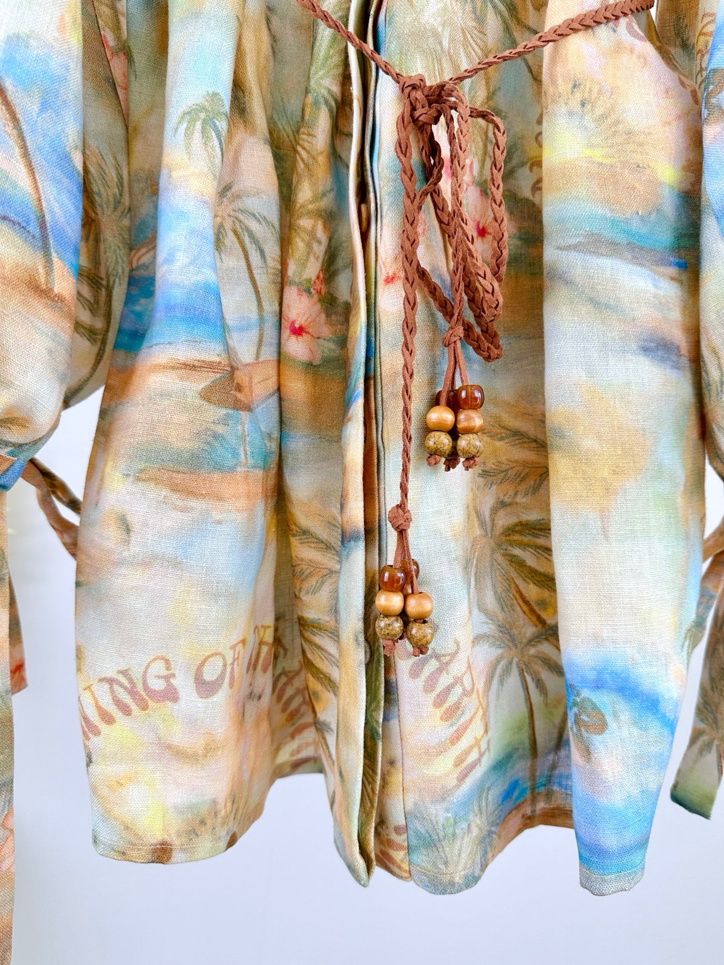 Robe courte en lin Zimmermann « ILLUMINATE » avec col à cordon et manches ballon – SS 2025