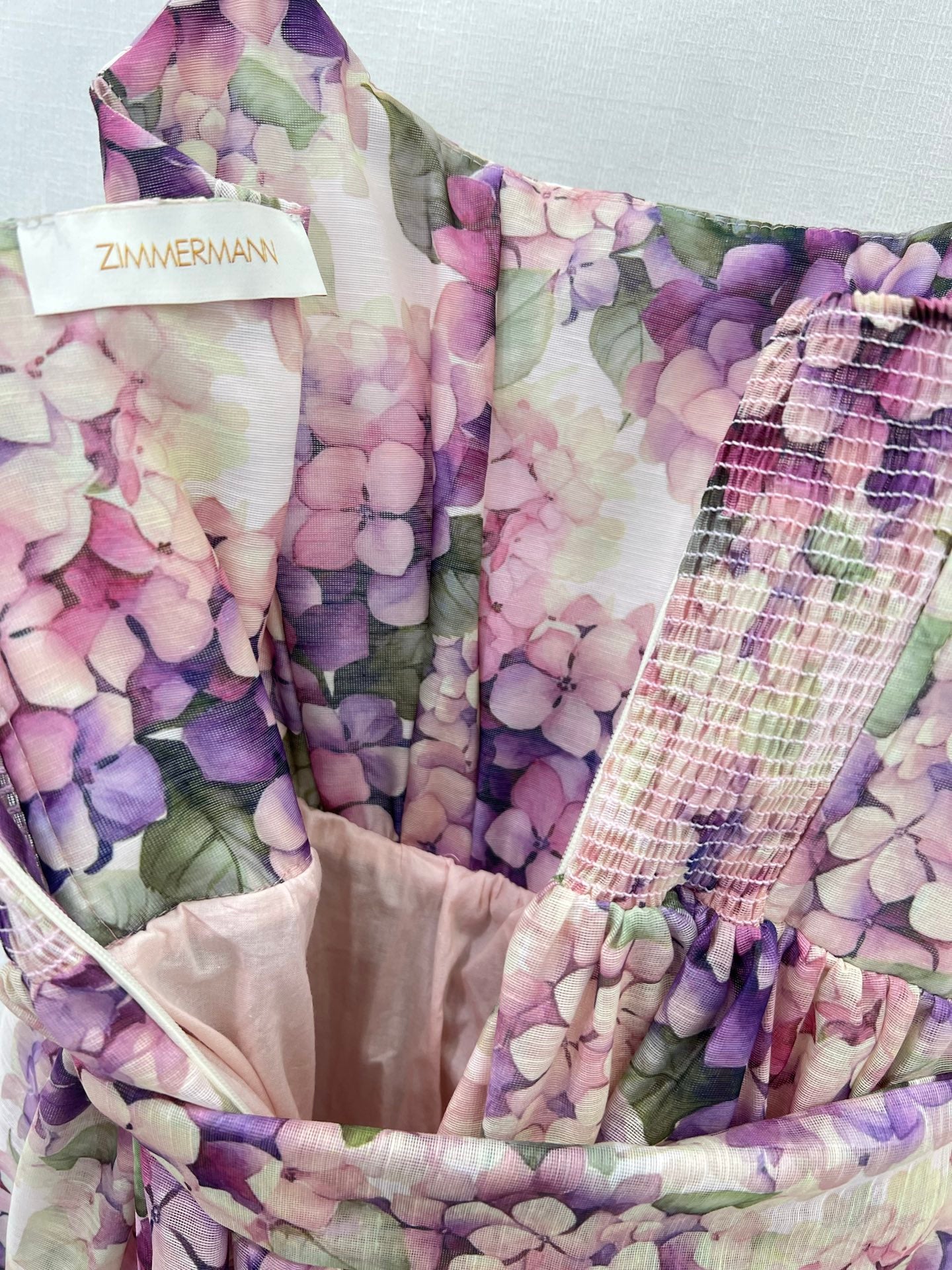 Robe à bretelles spaghetti nouée sur le devant en lin fleuri Zimmermann 2025