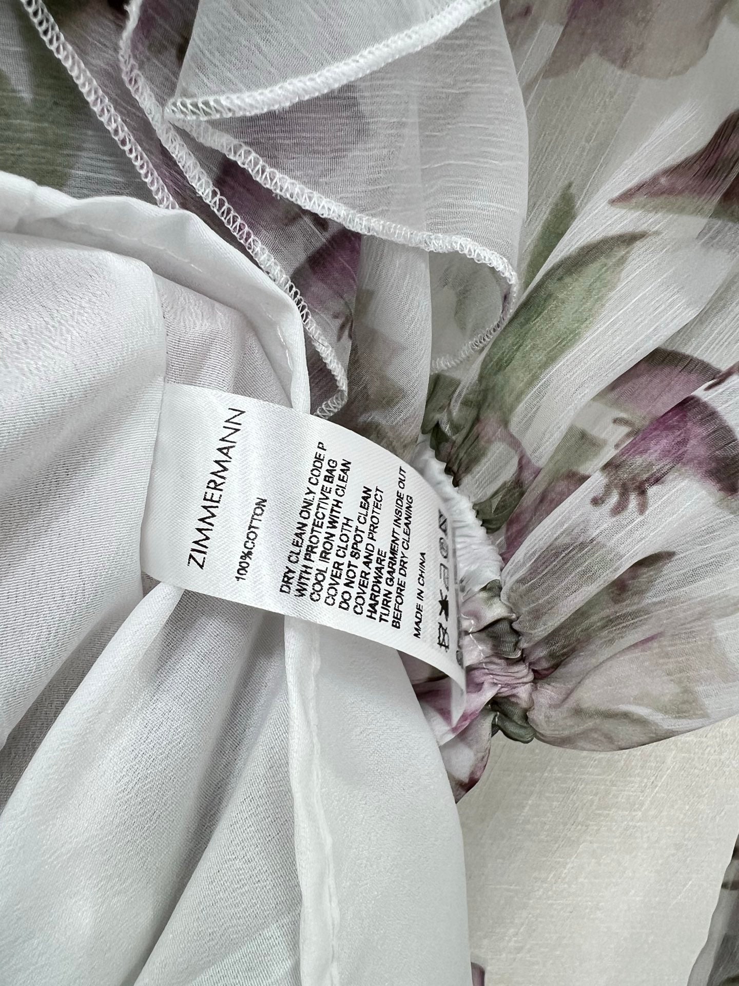 Robe courte fleurie à volants et col noué Zimmermann avec manches lanternes