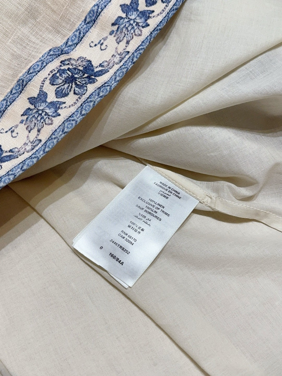 Robe midi en lin brodée de fleurs crème et bleue Zimmermann