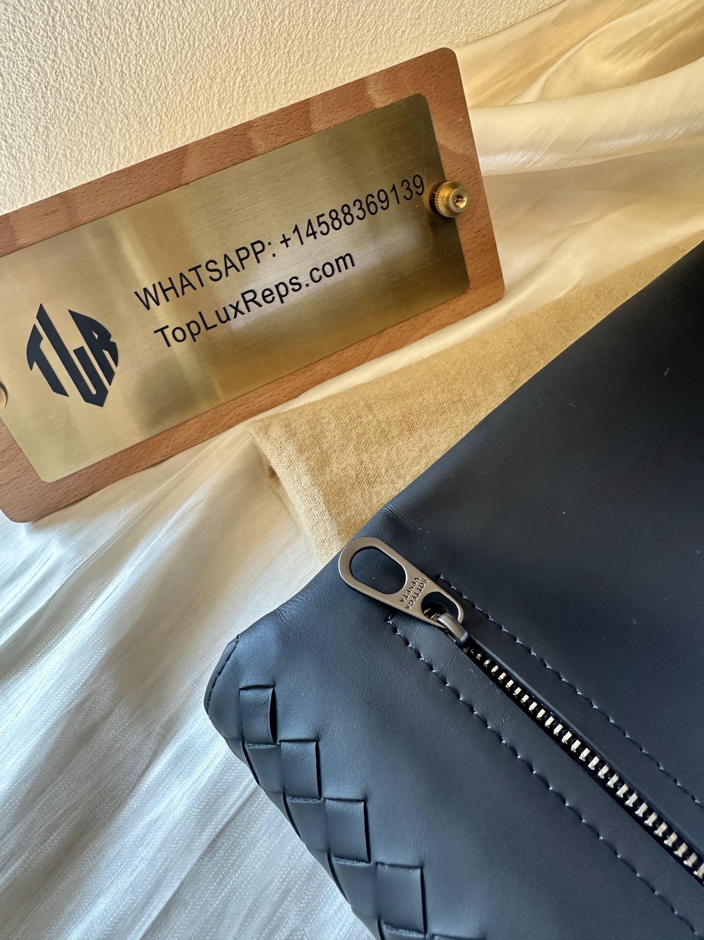 Bottega Veneta black leather mesh clutch bag