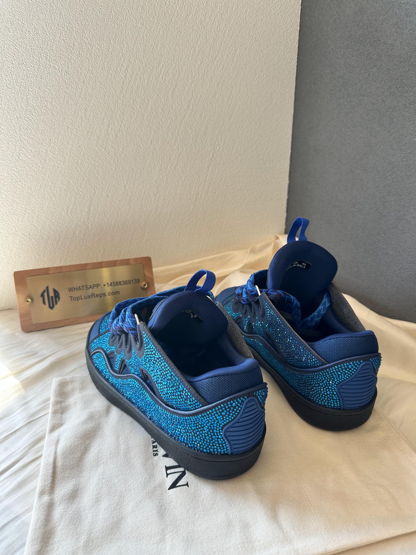 Lanvin curb sneakers in blue with rhinestone detailing