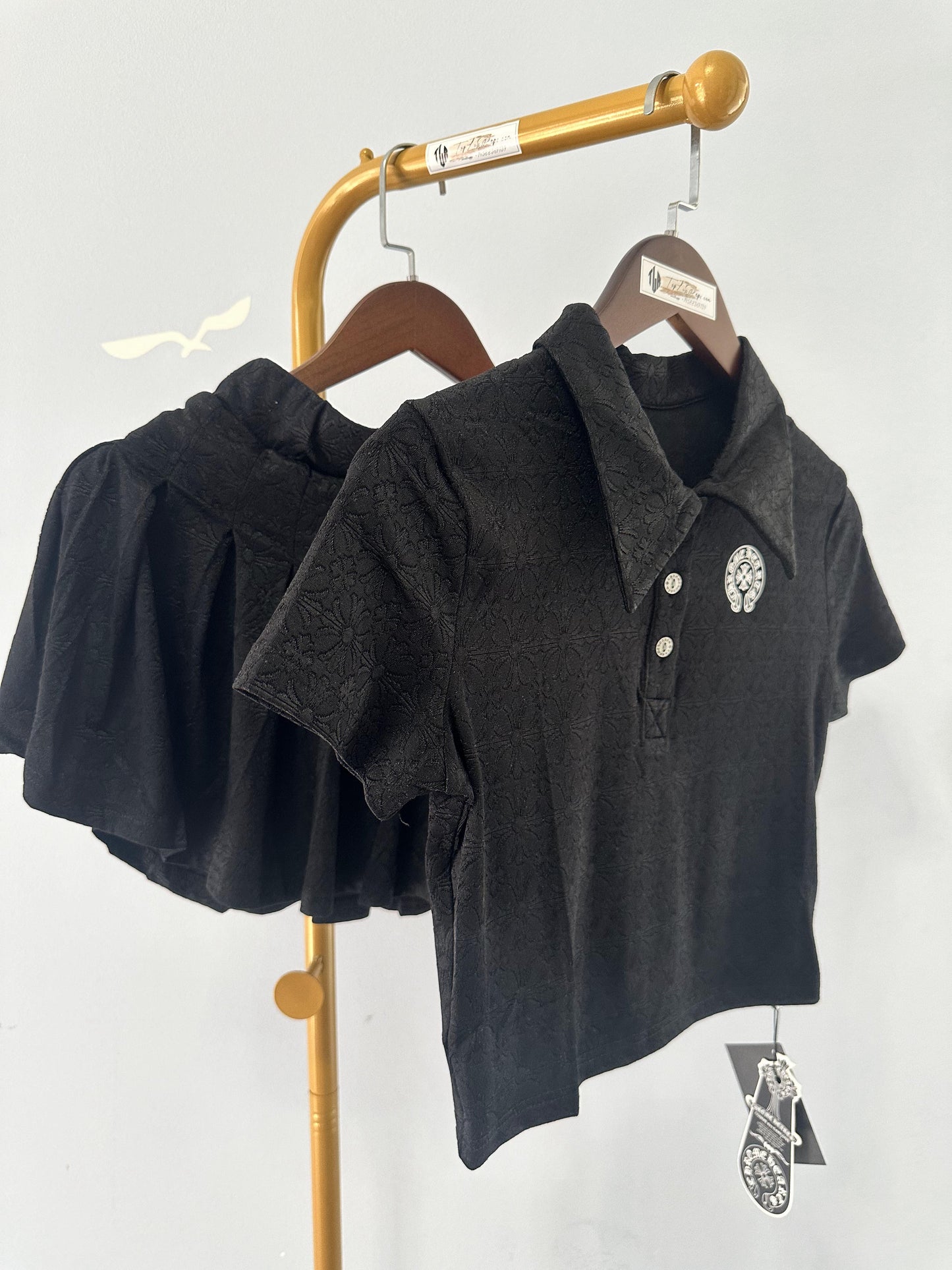 Chrome Hearts black embroidered polo crop top and pleated mini skirt set
