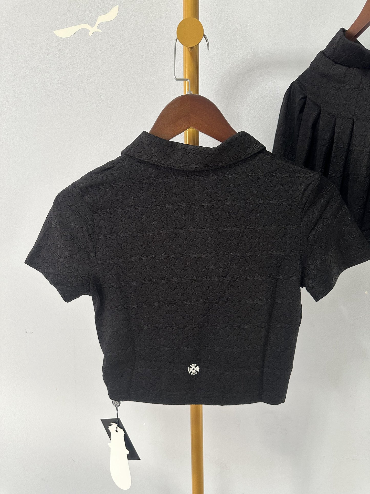 Chrome Hearts black embroidered polo crop top and pleated mini skirt set