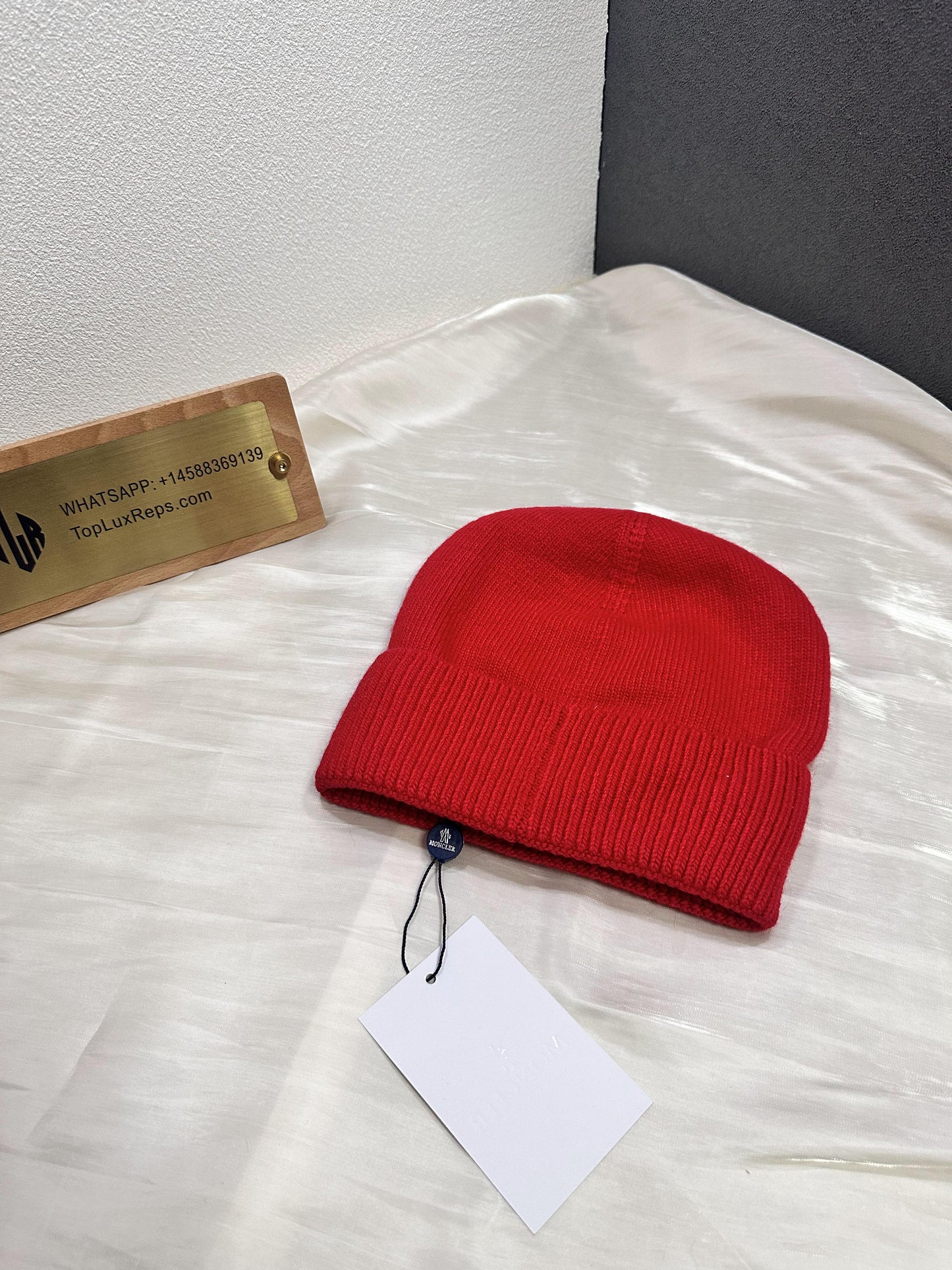 Moncler red wool beanie with iconic logo patch