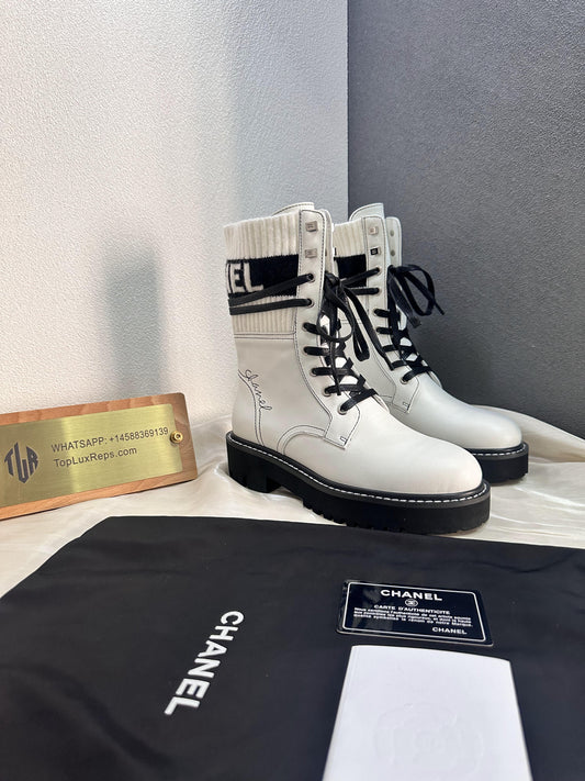 Chanel white combat boots with ribbed knit logo socks