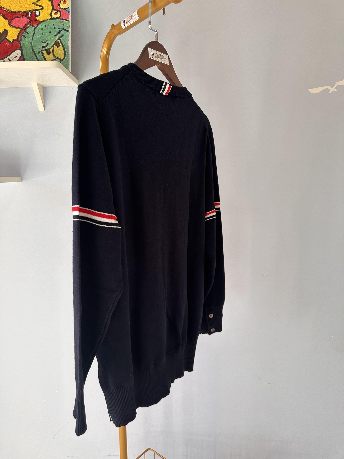 Thom Browne classic navy sweater with signature stripe detail