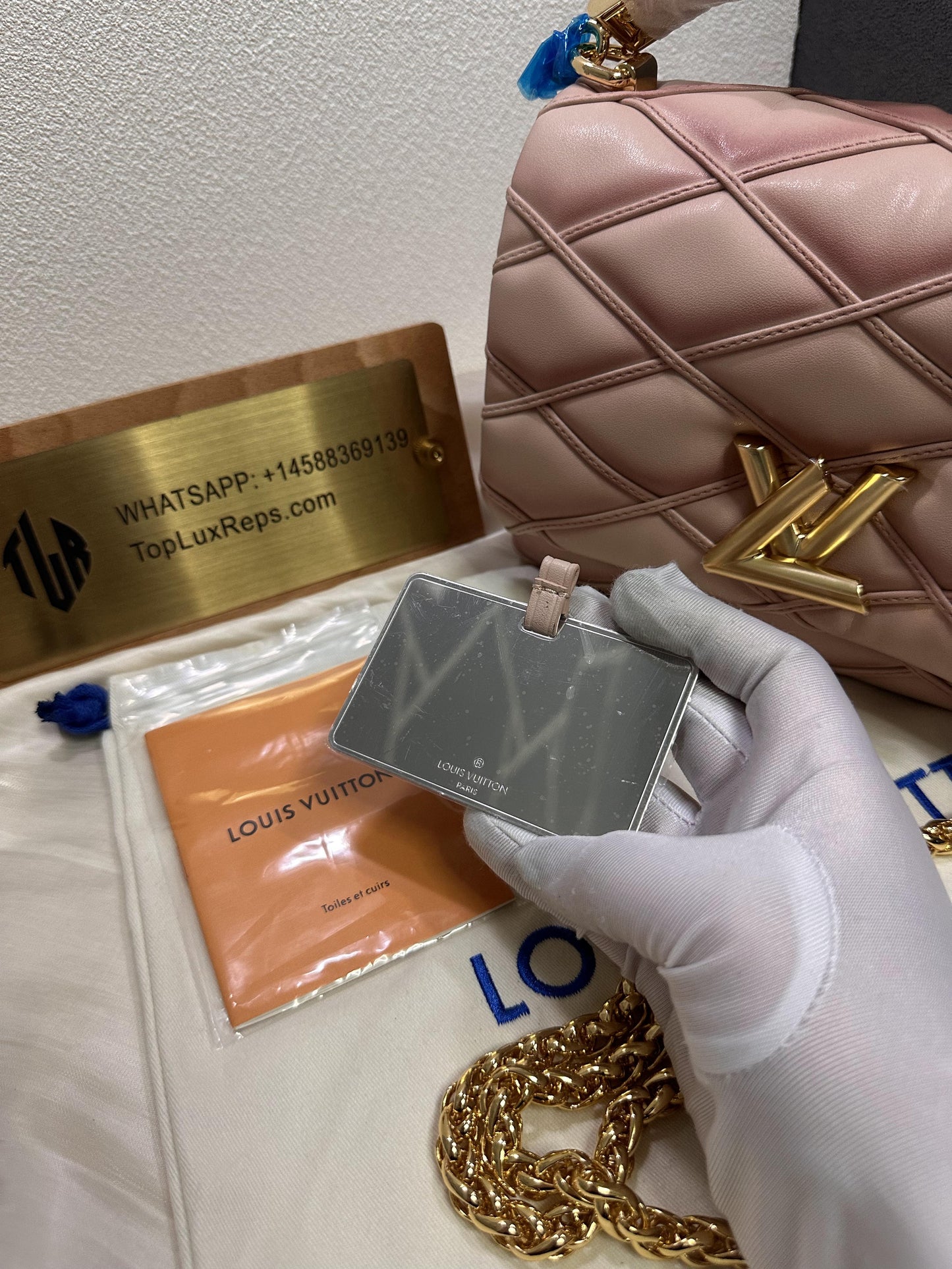 Title: Louis Vuitton New Wave Pink Quilted Leather Chain Bag with Gold LV Logo