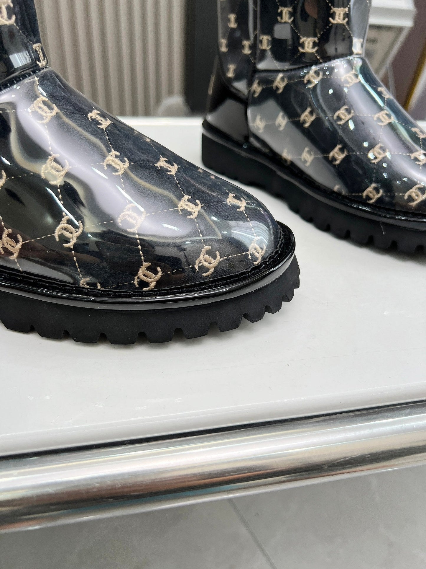 Chanel x UGG Vinyl Boots