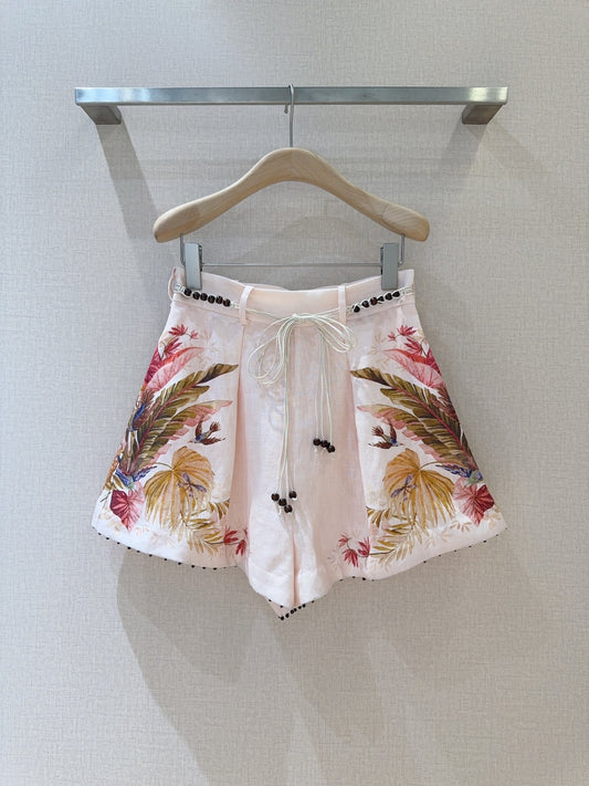 Short plissé en lin à imprimé palmiers Zimmermann – Crème florale