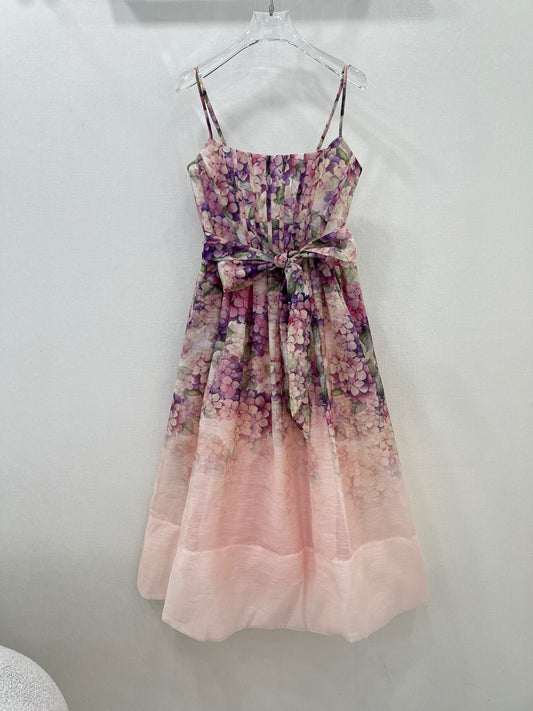 Robe à bretelles spaghetti nouée sur le devant en lin fleuri Zimmermann 2025