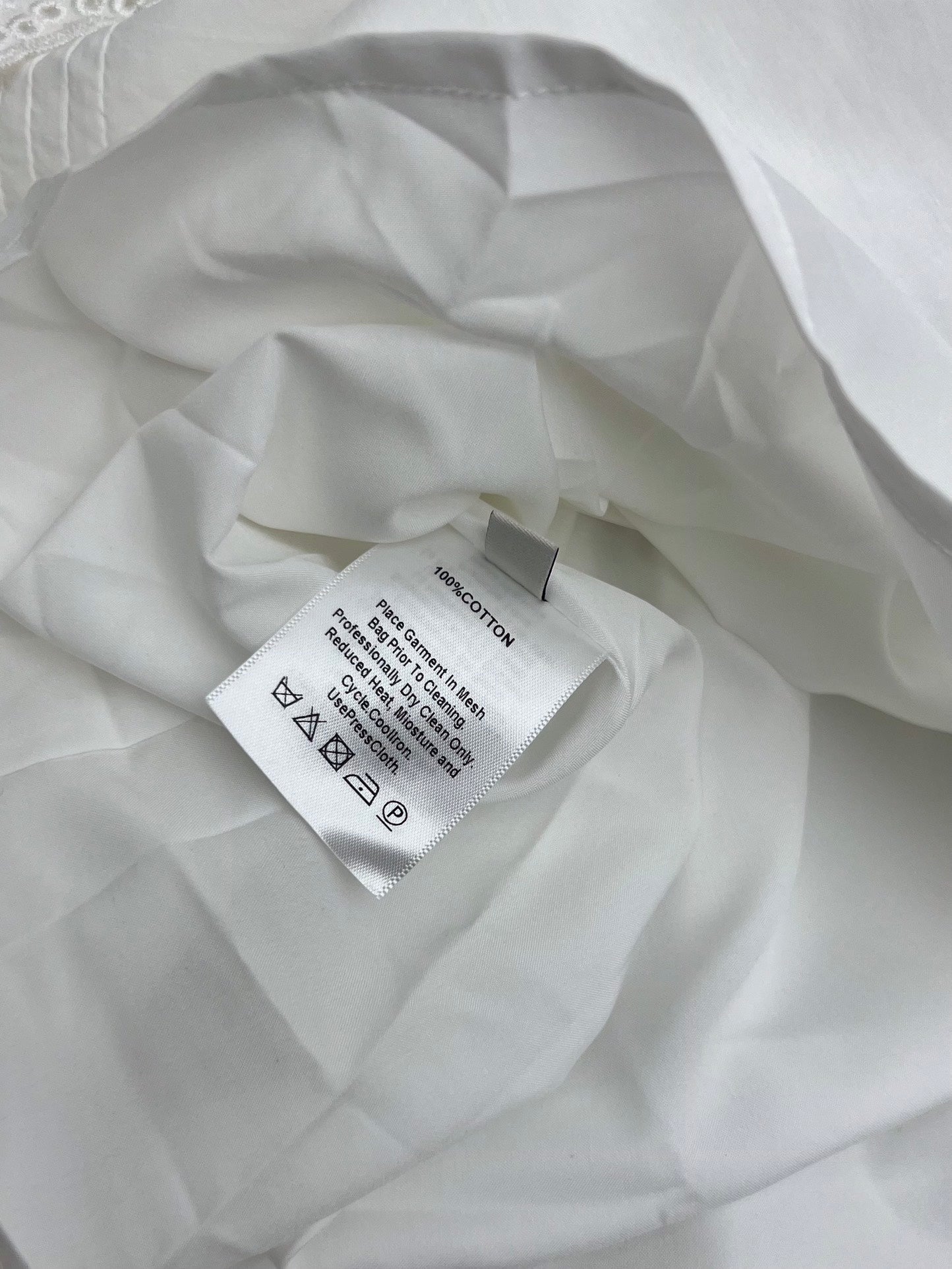 Gonna midi a trapezio con pizzo di cotone Zimmermann 2025